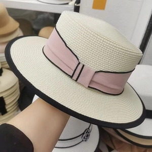 French vintage flat top straw sun hat for women with pink ribbon and black wide brim