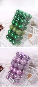 Detail view of purple and green Christmas balls with matte and glitter textures in baskets