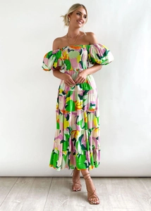 Detailed view of colorful abstract floral print maxi dress with puff sleeves and layered skirt