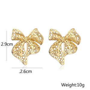 Gold hollow bow earrings 2.9cm x 2.6cm dimensions with 10g weight specifications