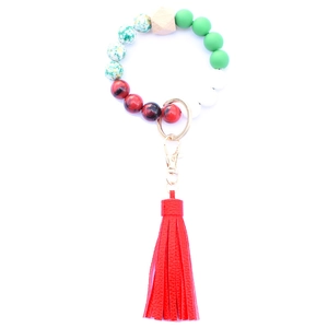 Christmas beaded bracelet keychain with red tassel, leopard wood bead and metal clasp