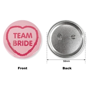 58mm Team Bride heart tinplate badge shown from front and back view with safety pin