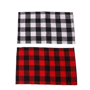 Classic red and black plaid fabric placemats for Christmas dining table decoration