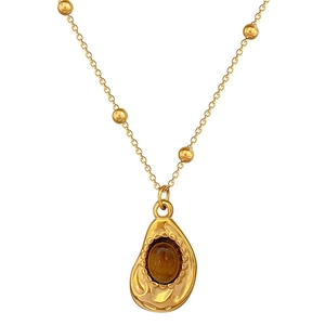 Gold titanium steel necklace with irregular teardrop pendant and brown gemstone center