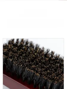 Detail showing dense premium boar bristles on a vintage men's wooden grooming brush