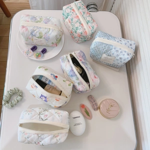 French country style quilted cotton cosmetic bags in assorted floral and checkered patterns