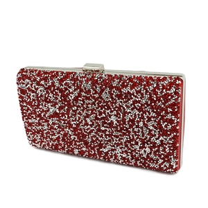 Detail of red and silver rhinestone evening clutch bag with metallic frame and top lock