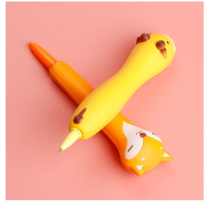 Macro detail of squishy animal pens featuring a yellow shiba inu and orange fox design