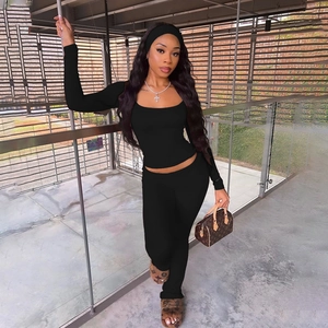 Chic black slim-fit two-piece set featuring a square neck long sleeve top and high waist pants