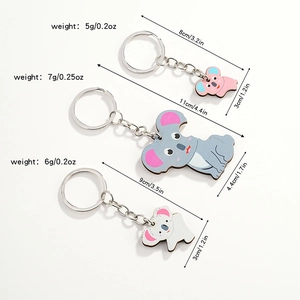 Three cute koala wooden keychains in different sizes and colors for children and parents