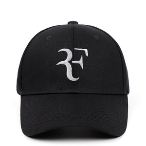 Detail of high-quality white RF logo embroidery on a black cotton baseball cap
