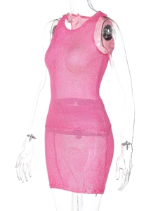 Detailed view of the bright pink knit fabric with a fine mesh texture on a sleeveless dress