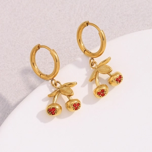 Detail of 18K gold plated cherry drop earrings featuring vibrant red crystal rhinestones