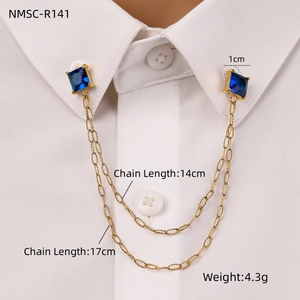 Detail of square blue zircon collar pins with golden double-layer chains on shirt