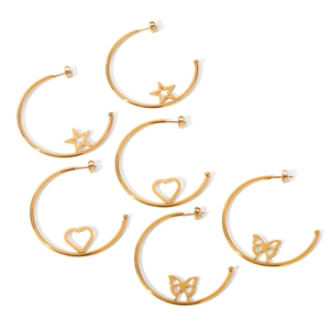 Three pairs of gold C-shaped hoop earrings with star, heart, and butterfly charms