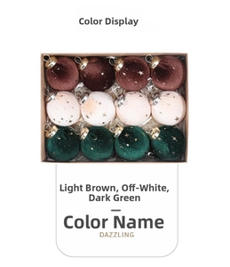 Top view of 12 velvet Christmas balls with gold star patterns in a kraft gift box
