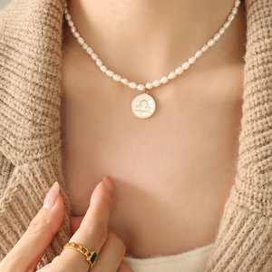 Elegant Libra constellation shell pendant necklace with white freshwater pearls for women