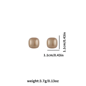 Detailed view of square geometric pearl earrings with dimensions 1.1cm and 3.7g weight
