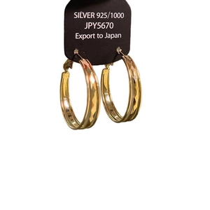 Golden 925 silver chunky hoop earrings with intricate diamond-cut textured patterns
