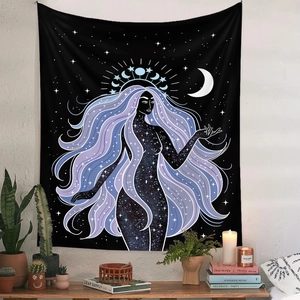 Detail of bohemian tapestry featuring a celestial goddess hung over a modern shelf