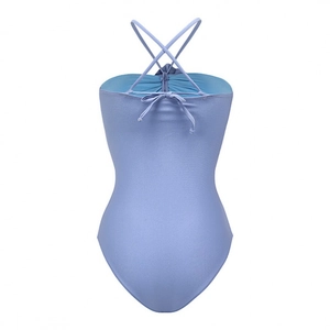 Back view of light blue one-piece swimsuit with 3D flower cutout and lace-up back design