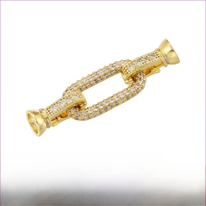 Detail of 18K gold plated brass rectangular clasp with white zircon stones for jewelry