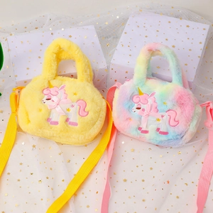 Plush unicorn shoulder bags in yellow and rainbow colors with detailed embroidery