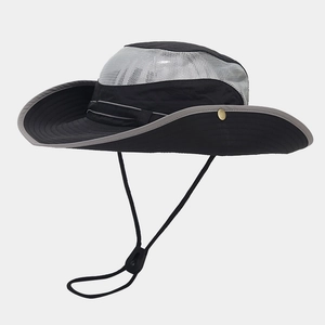 Detail of outdoor safari hat showing breathable mesh, waterproof fabric, and metal buttons