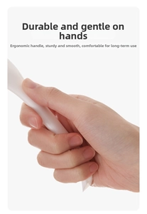 Ergonomic white handle of the kitchen brush for a comfortable and non-slip grip