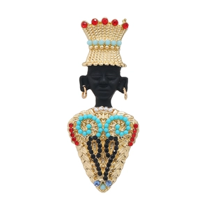 Vintage exotic chieftain brooch with gold crown, colorful rhinestones, and pearls