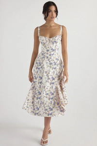 Detail view of French floral sundress featuring lace-up bodice and slim shoulder straps