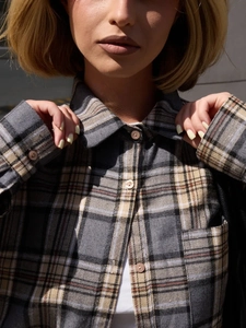 Classic flannel plaid shirt featuring vintage grey and black pattern with chest pocket