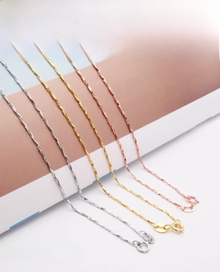 Detail of S925 sterling silver water wave chains in silver, gold, and rose gold finishes