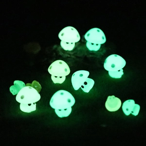 Luminous green resin mushrooms for micro landscape decoration in dark settings