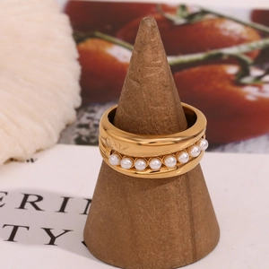 Elegant 18K gold plated stainless steel wide band ring featuring central pearl inlay