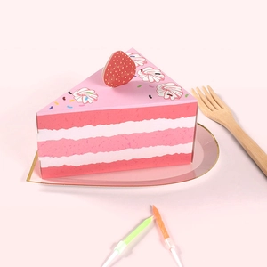 Pink triangular cake-shaped party gift box with strawberry patterns and wooden fork