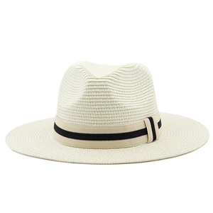 Close-up of fine straw weave and striped elastic band on a cream Panama hat