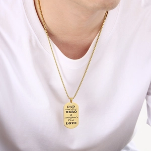Golden titanium steel military tag necklace with Dad Hero engraving worn by model