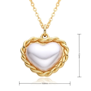 Detail shot of heart pendant with size measurements 17.2mm by 18.8mm on white background