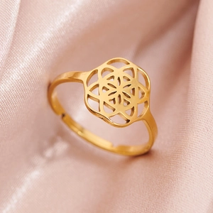 Minimalist 18K gold plated hollow mandala flower open ring on pink silk fabric