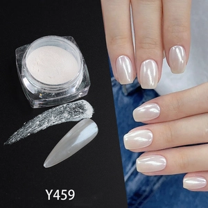 Macro view of white aurora nail glitter powder Y459 with pearl luster on nails