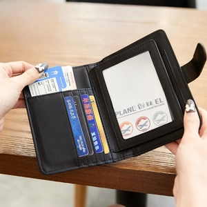 Slim black PU leather passport holder with RFID blocking and multiple card slots