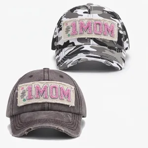 Distressed baseball cap with #1 MOM towel embroidery in camo and washed dark gray