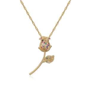 Detail of 18K gold-plated rose pendant necklace with colorful cubic zirconia stones