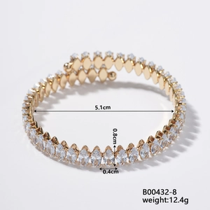 Detail view of a gold diamond-shaped bracelet with dimensions 5.1cm by 0.8cm for women