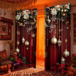 Detail of red Christmas curtains with metallic grommets and festive floral holiday patterns