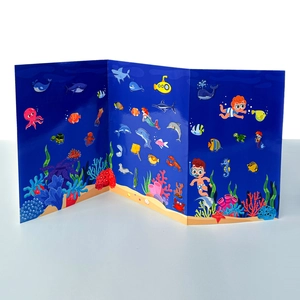 Detailed tri-fold ocean theme sticker book showing colorful sea creatures and coral reef