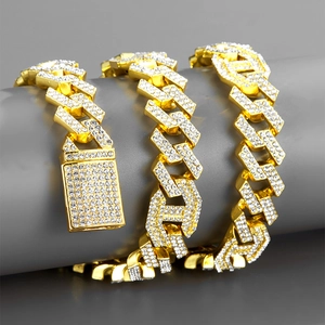 Chunky gold hip hop Cuban link chain necklace fully iced out with sparkling crystals