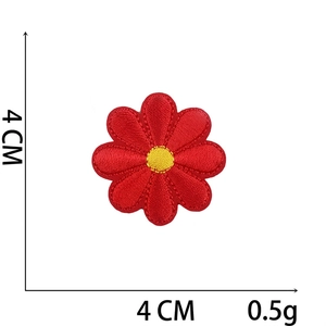 Detail of red flower embroidery patch with yellow center, size 4x4cm, 0.5g weight
