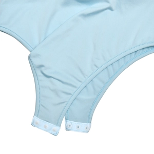 Close-up of light blue bodysuit with snap button closure and smooth elastic fabric
